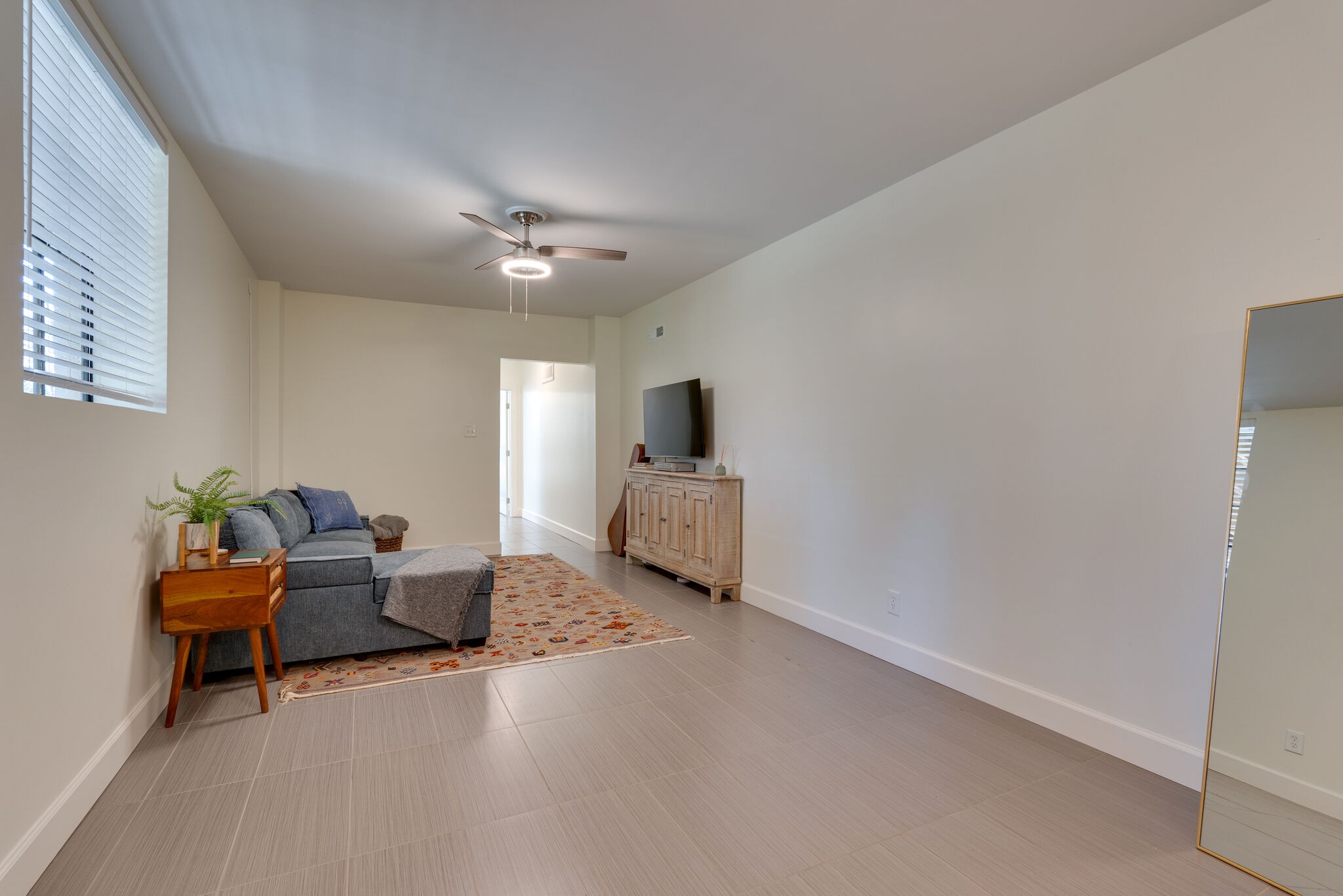 4529 Shys Hill Road Nashville, TN 37215 - Photo 35 of 51 a living room with furniture and a flat screen tv