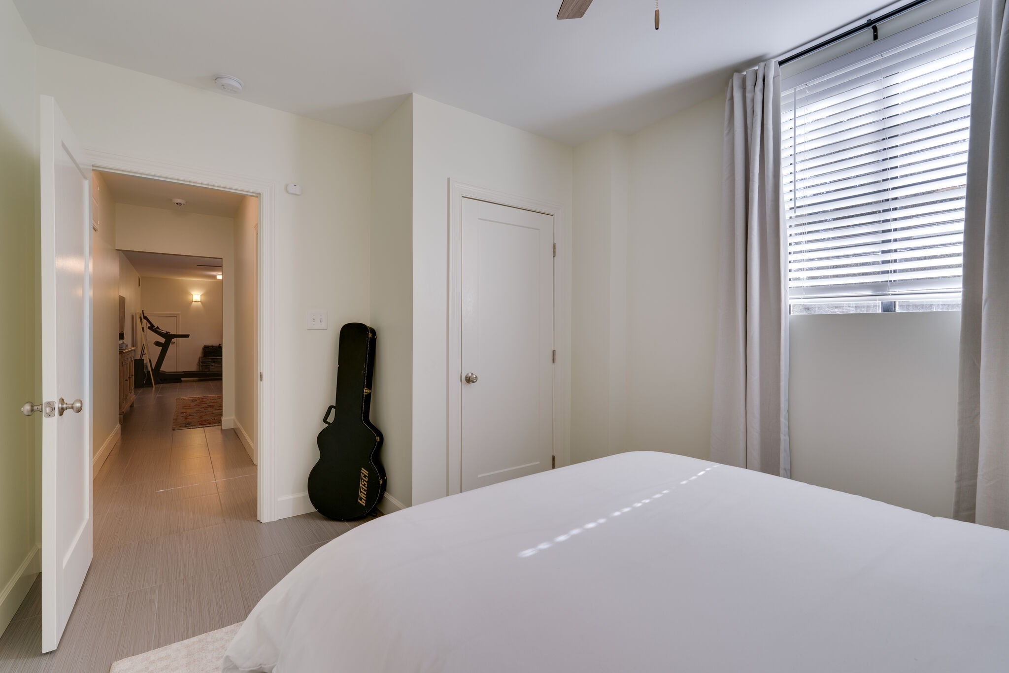 4529 Shys Hill Road Nashville, TN 37215 - Photo 37 of 51 a bedroom with a bed and a window