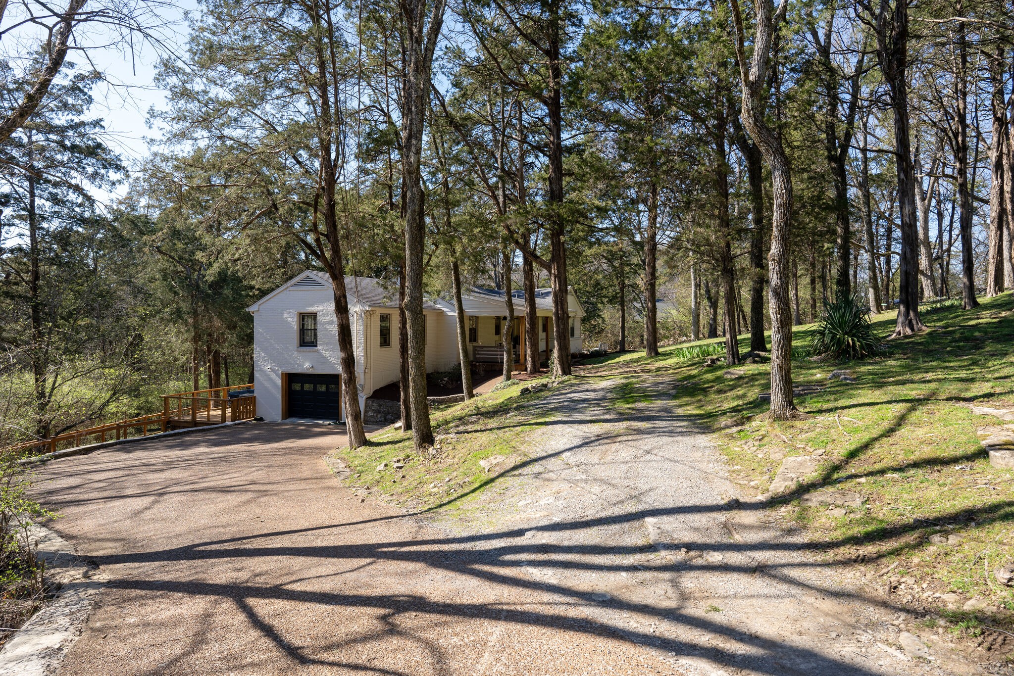 4529 Shys Hill Road Nashville, TN 37215 - Photo 48 of 51 a view of a house with snow on the road