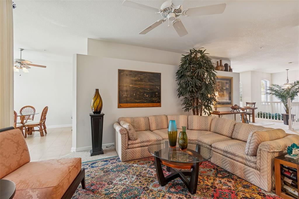 894 Lantern Way Clearwater, FL 33765 - Photo 14 of 75 a living room with furniture and a potted plant