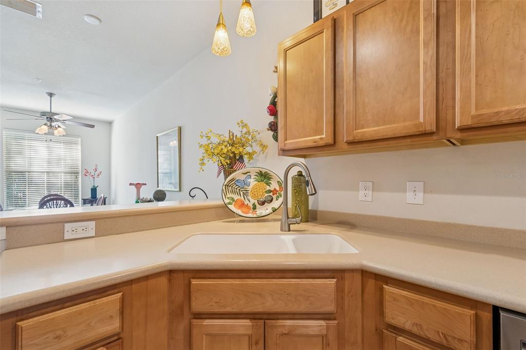 894 Lantern Way Clearwater, FL 33765 - Photo 19 of 75 a kitchen with a sink and a cabinets