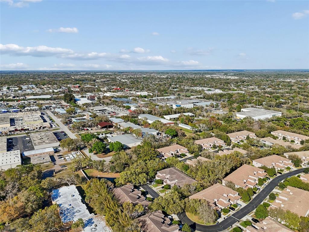 894 Lantern Way Clearwater, FL 33765 - Photo 74 of 75 an aerial view of a city with lots of residential buildings