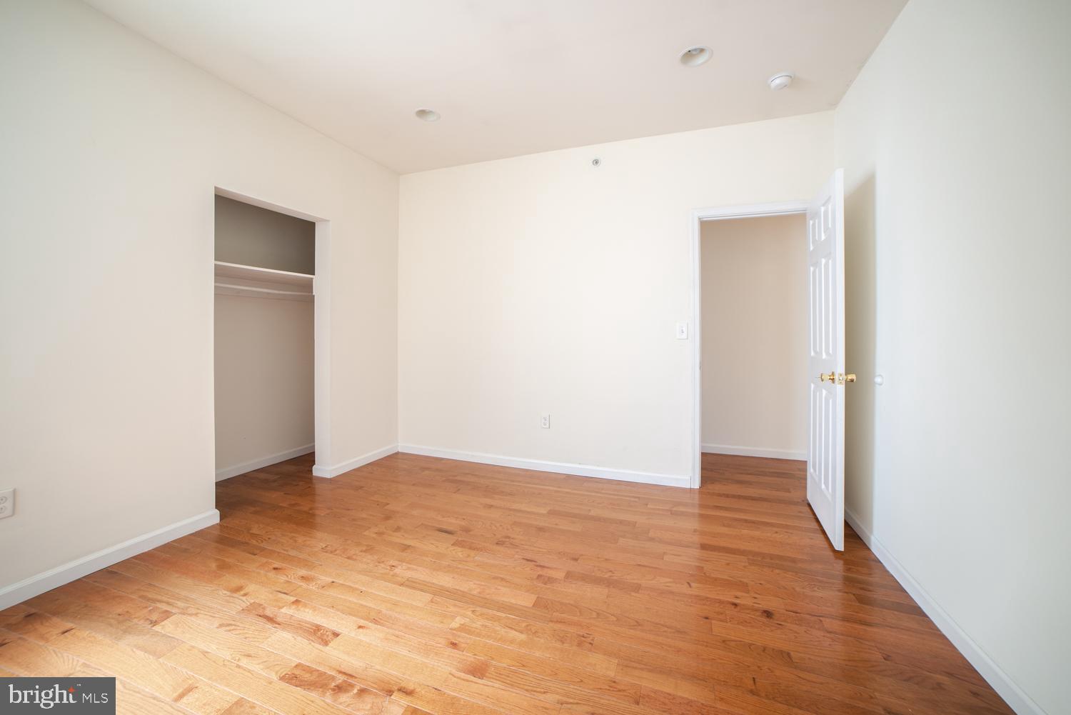 1838 North 16th Street, Unit 2 Philadelphia, PA 19121 - Photo 13 of 17 a view of an empty room with wooden floor