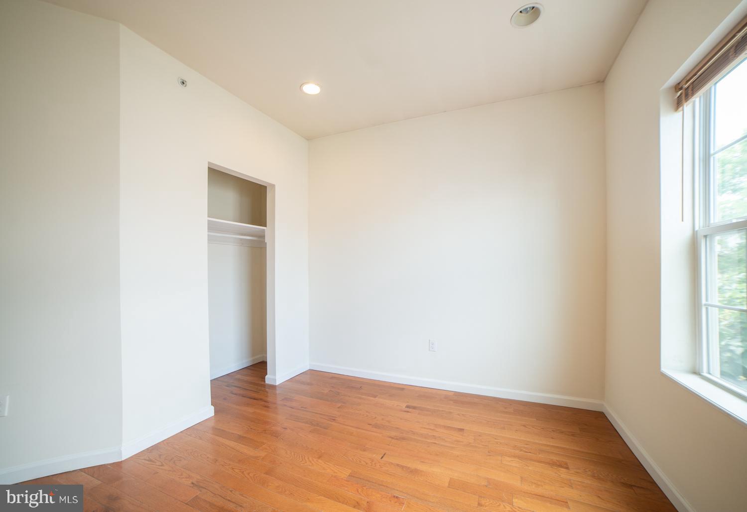1838 North 16th Street, Unit 2 Philadelphia, PA 19121 - Photo 14 of 17 a view of empty room with wooden floor and fan