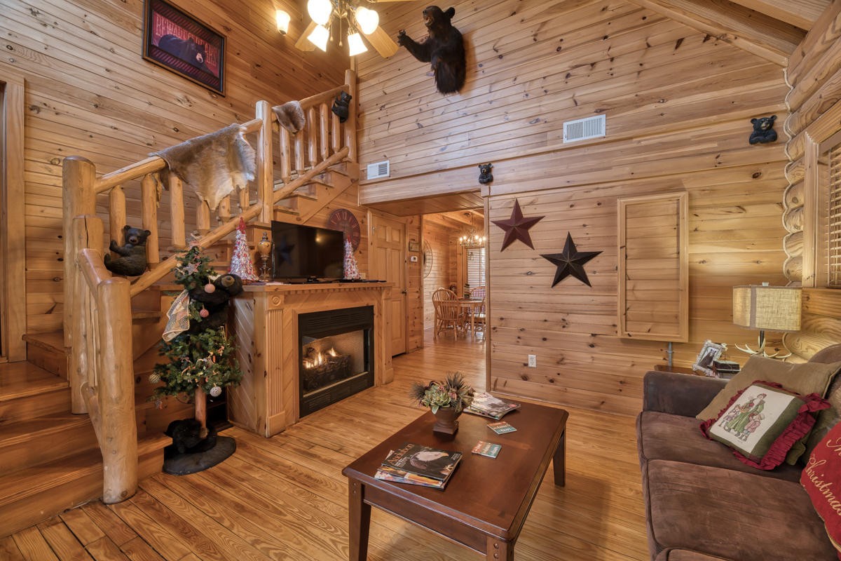 3124 Smoky Ridge Way Sevierville, TN 37862 - Photo 4 of 14 a living room with furniture and a fireplace