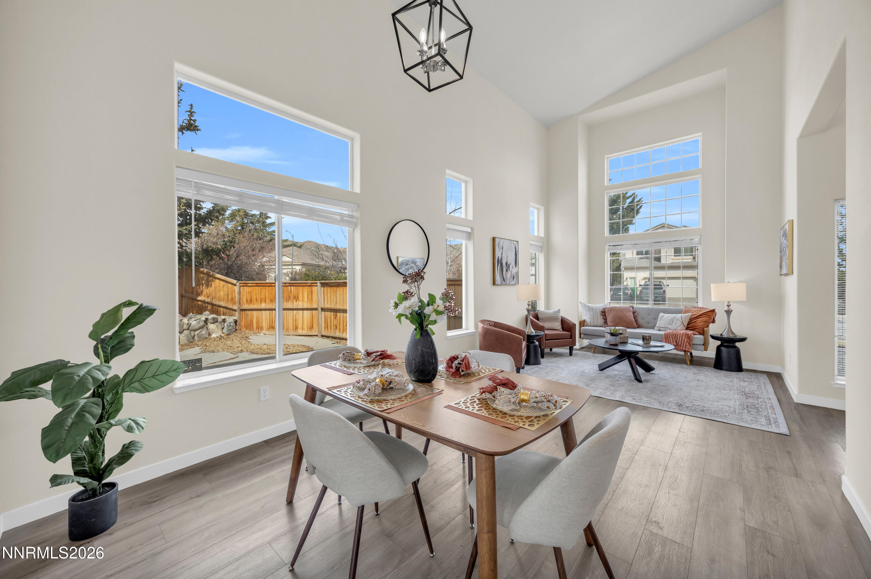 5420 Brittania Drive Reno, NV 89523 - Photo 1 of 25 a view of a dining room with furniture window and wooden floor