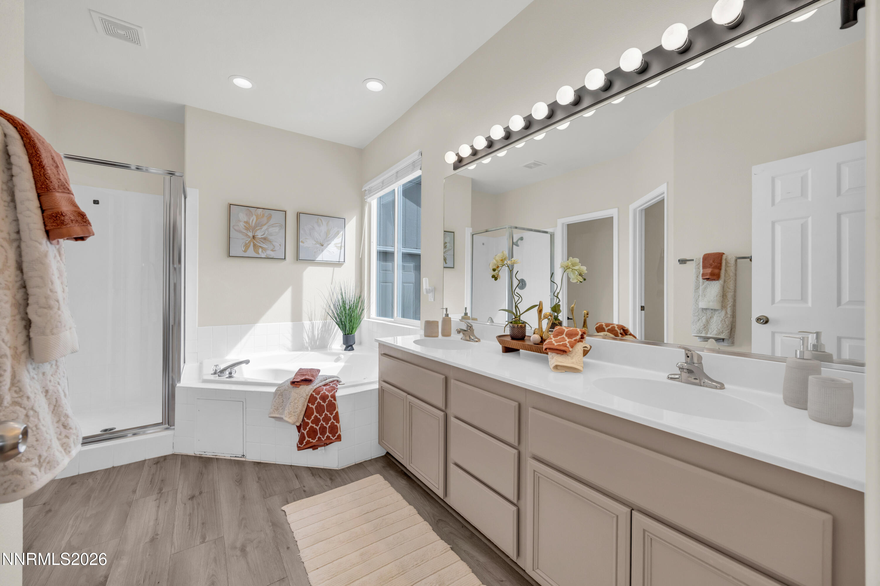 5420 Brittania Drive Reno, NV 89523 - Photo 18 of 25 a very nice looking room with a large mirror and a ceiling fan