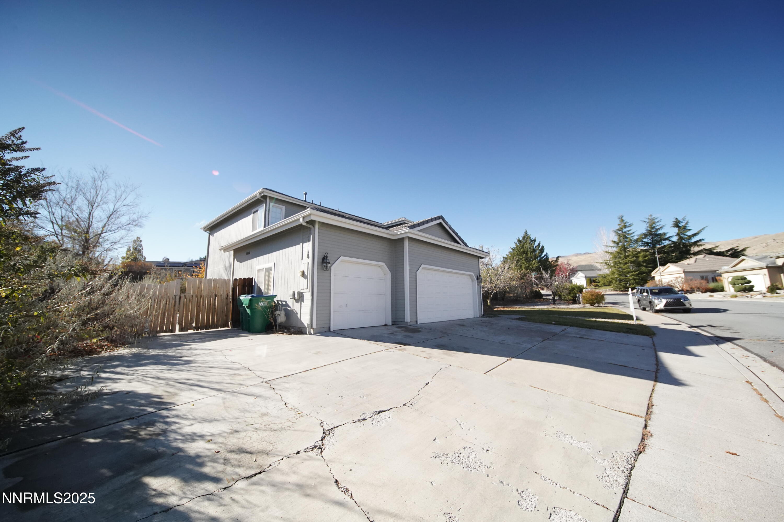 5420 Brittania Drive Reno, NV 89523 - Photo 24 of 25 a spacious bathroom with a tub and trees in the background