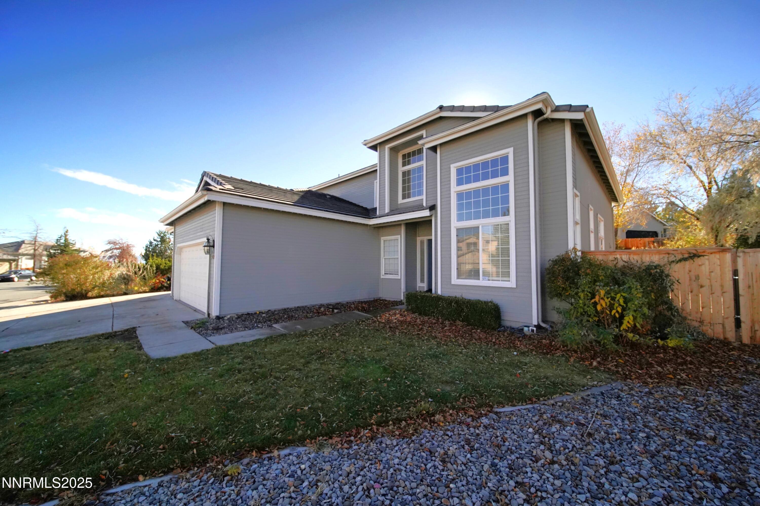 5420 Brittania Drive Reno, NV 89523 - Photo 3 of 25 a front view of a house with garden