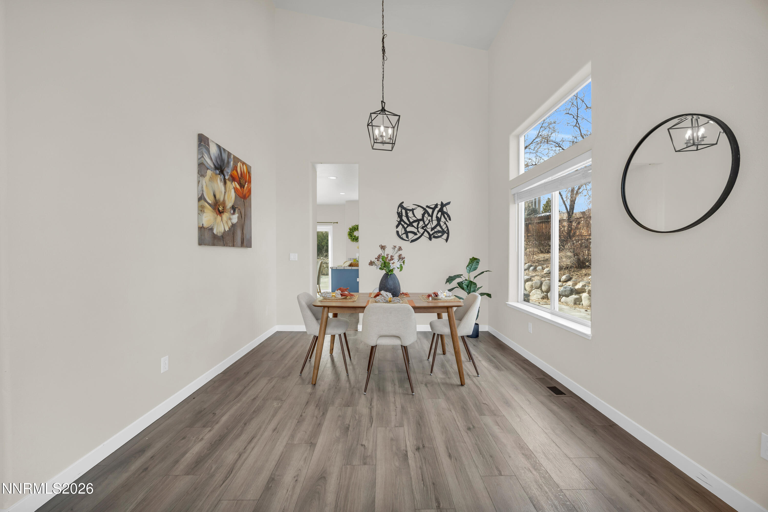 5420 Brittania Drive Reno, NV 89523 - Photo 6 of 25 a dining room with furniture a window and wooden floor