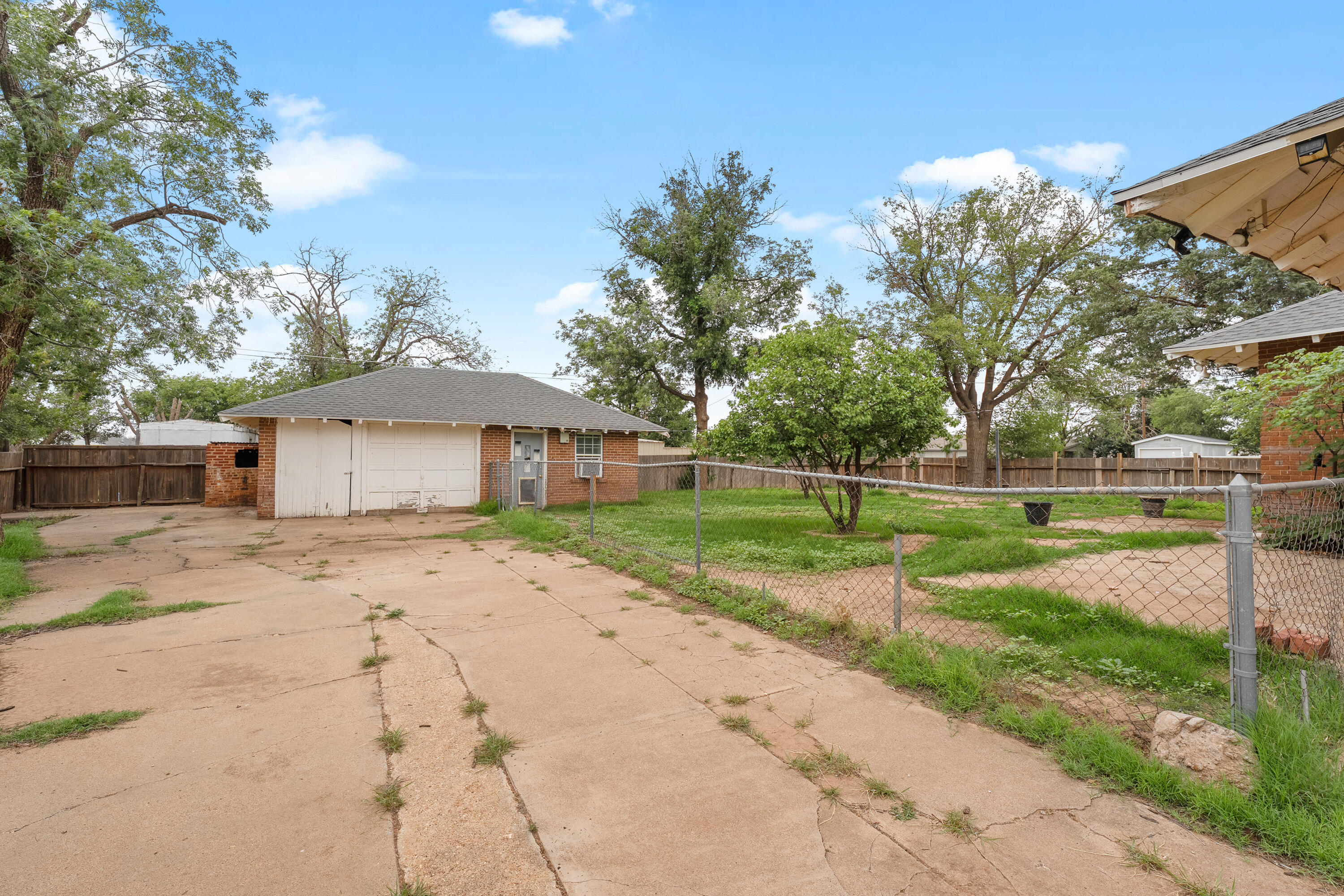 500 West Garza Street Slaton, TX 79364 - Photo 24 of 24 a view of a house with a yard