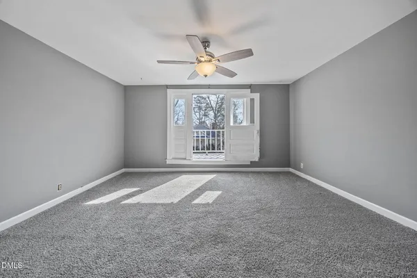 a view of livingroom with furniture and windows