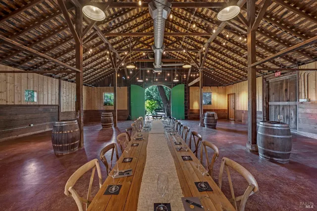 a view of a chairs and table in the patio