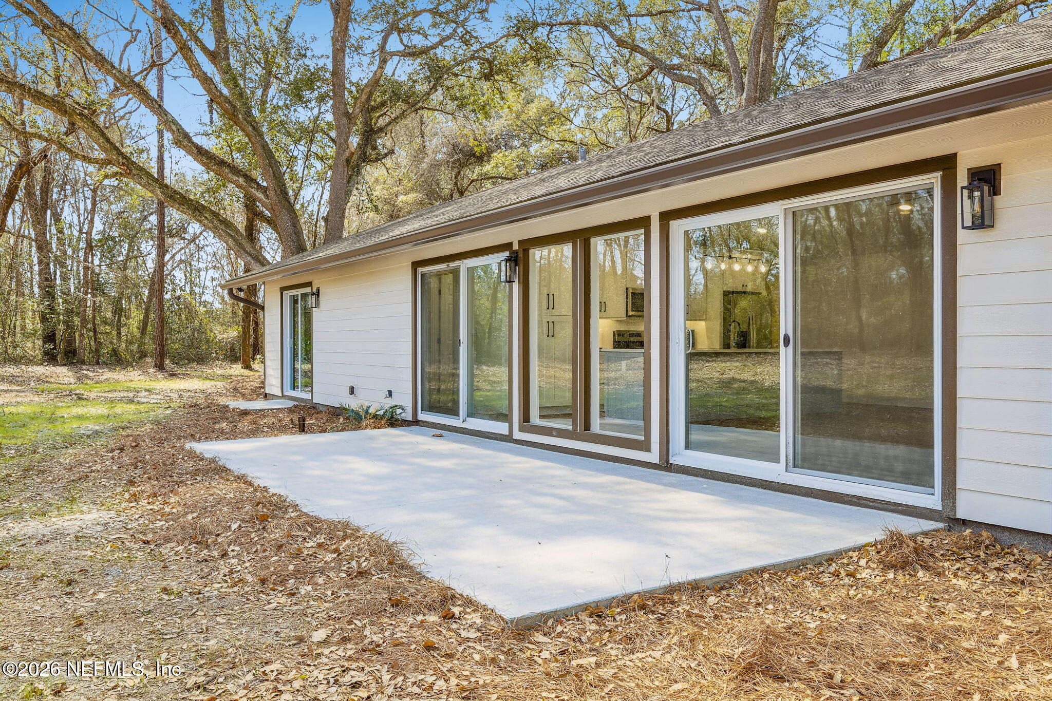 16684 Oak Hill Road Hilliard, FL 32046 - Photo 23 of 33 a view of backyard with green space