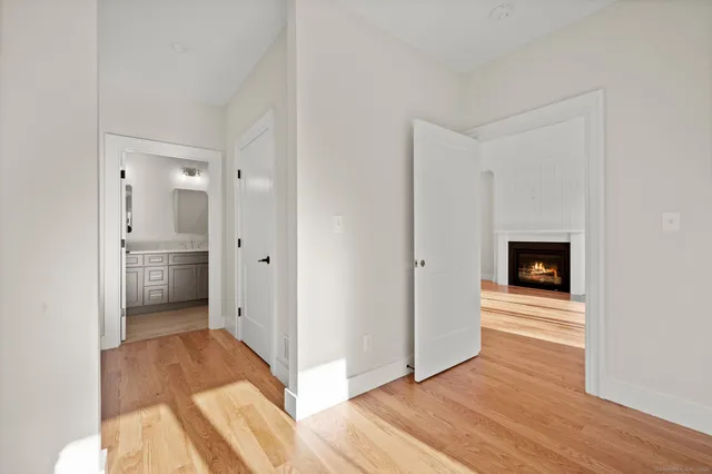 a bathroom with a shower and a sink
