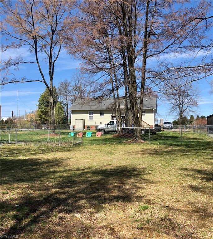 920 East Meadow Road Eden, NC 27288 - Photo 18 of 18 view of back open back yard with 90 x 100 fenced area with 3 gates, 1 double gate