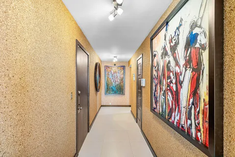 a living room with furniture or kitchen view and a couch