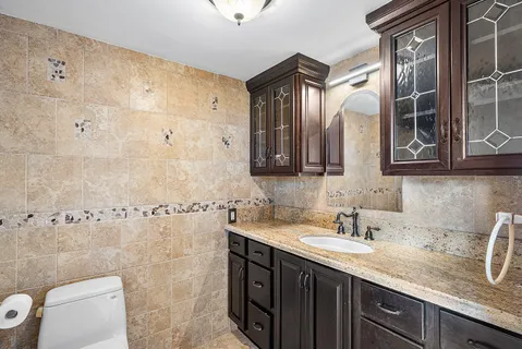 a view of a balcony with wooden floor