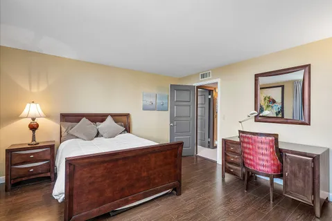 a bedroom with a bed and furniture