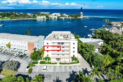 a view of a chairs and table in a patio