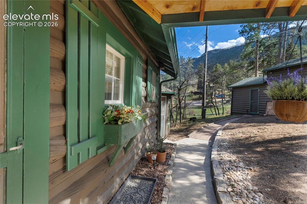 9120 Ute Road Cascade, CO 80809 - Photo 2 of 38 So cute you could pinch its shutters!