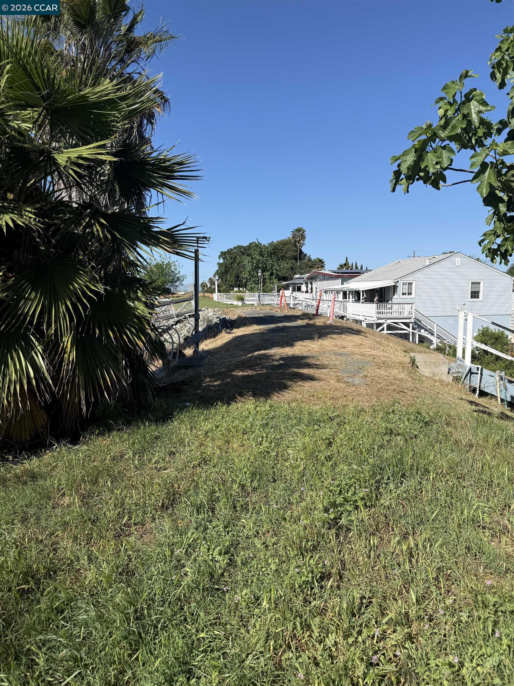 1766 Taylor Road Bethel Island, CA 94511 - Photo 5 of 22 a view of a yard with an outdoor space