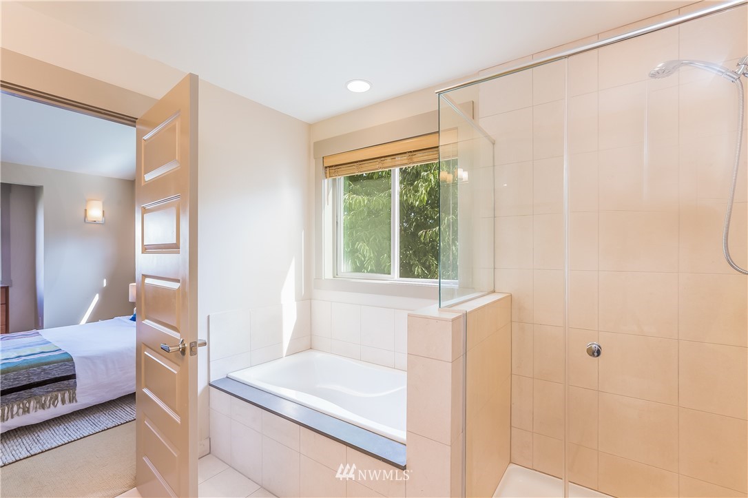 4840 40th Avenue Southwest, Unit B Seattle, WA 98116 - Photo 14 of 26 a bathroom with a sink and a mirror