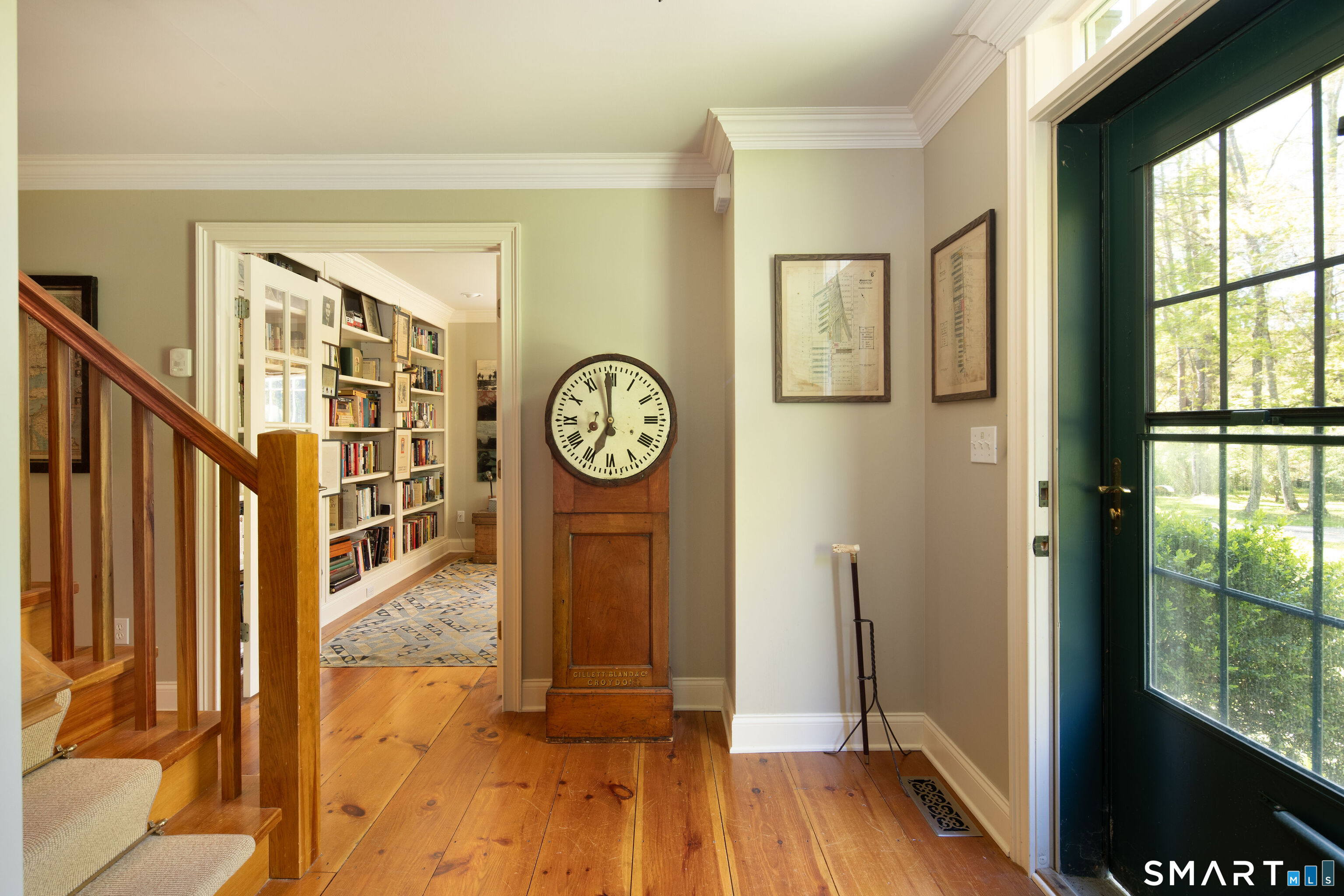 7 Cooper Hill Road Salisbury, CT 06068 - Photo 23 of 36 a view of a hallway with wooden floor and a window