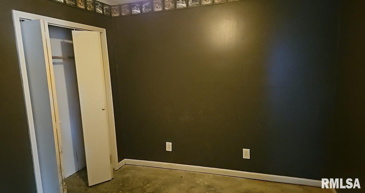 90 Carlock Road Murphysboro, IL 62966 - Photo 14 of 15 a view of a livingroom with an empty space and a window