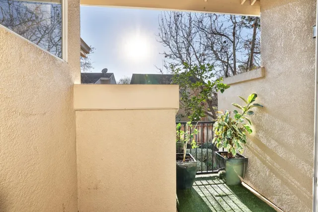 a vase of flowers sitting on a table