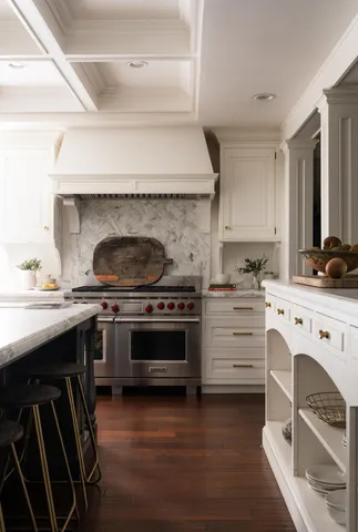 a kitchen with a stove and a sink