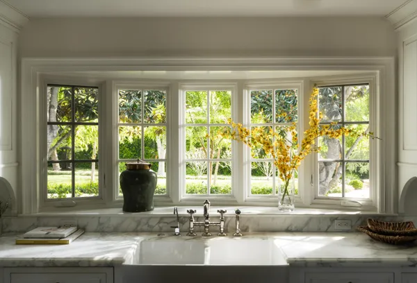 a view of a sink and a window