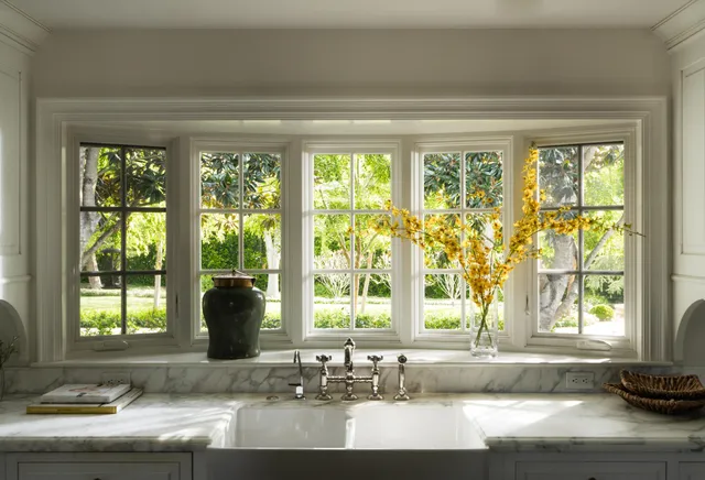 a view of a sink and a window
