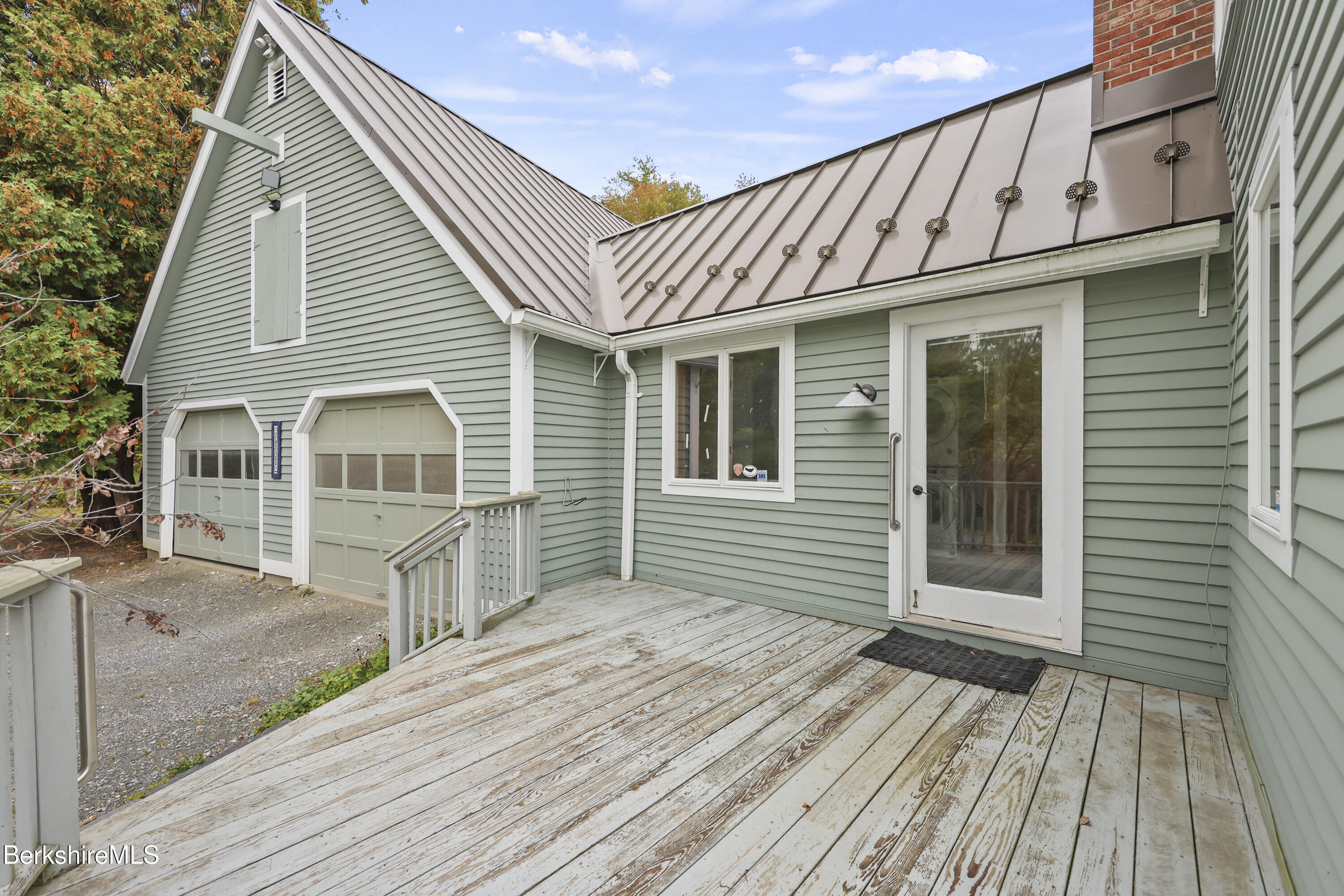 1030 Simonds Road Williamstown, MA 01267 - Photo 59 of 76 a view of a house with a roof deck