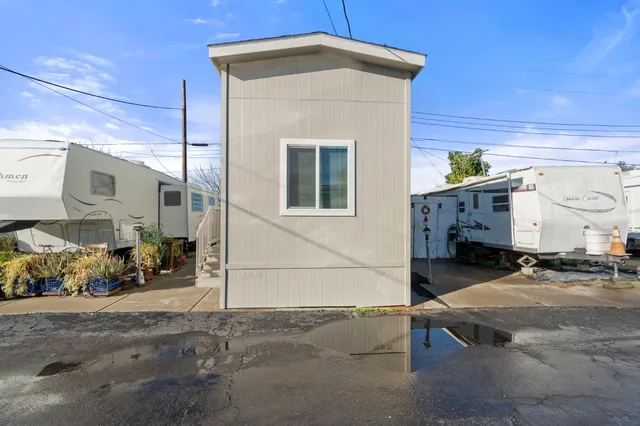 a front view of a building with garage