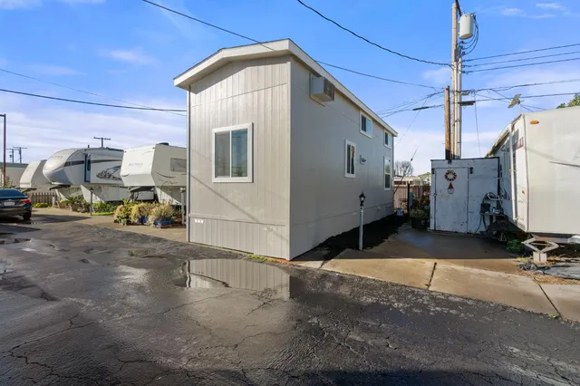a view of a back yard of the house