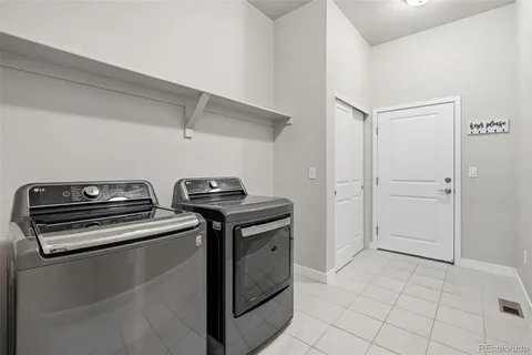 a view of a kitchen with appliances
