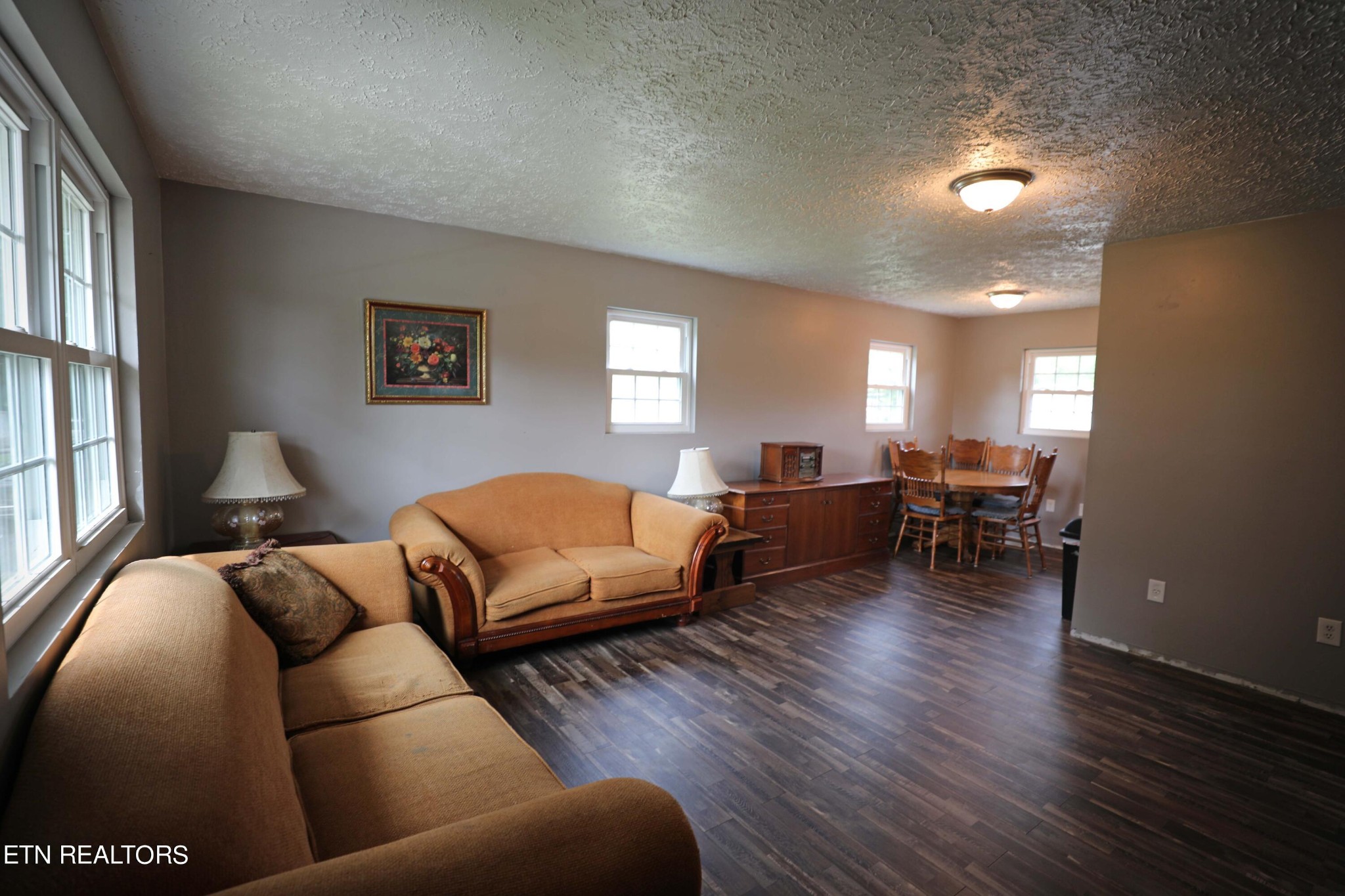 7816 Majors Road Corryton, TN 37721 - Photo 4 of 13 a living room with furniture and a wooden floor
