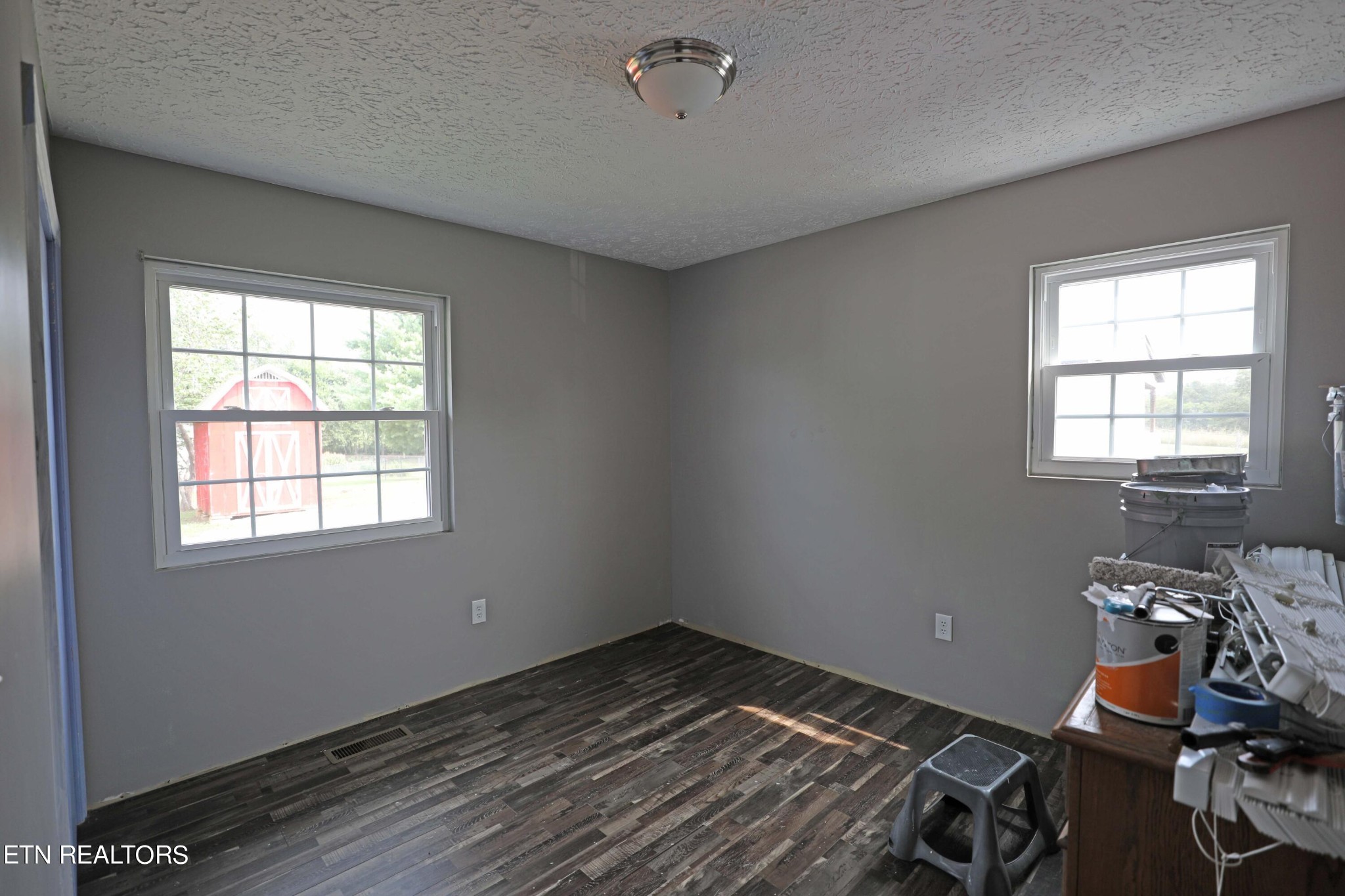 7816 Majors Road Corryton, TN 37721 - Photo 9 of 13 a view of a room with wooden floor and lounge chair