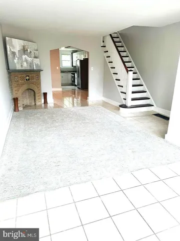 a view of kitchen with furniture and window