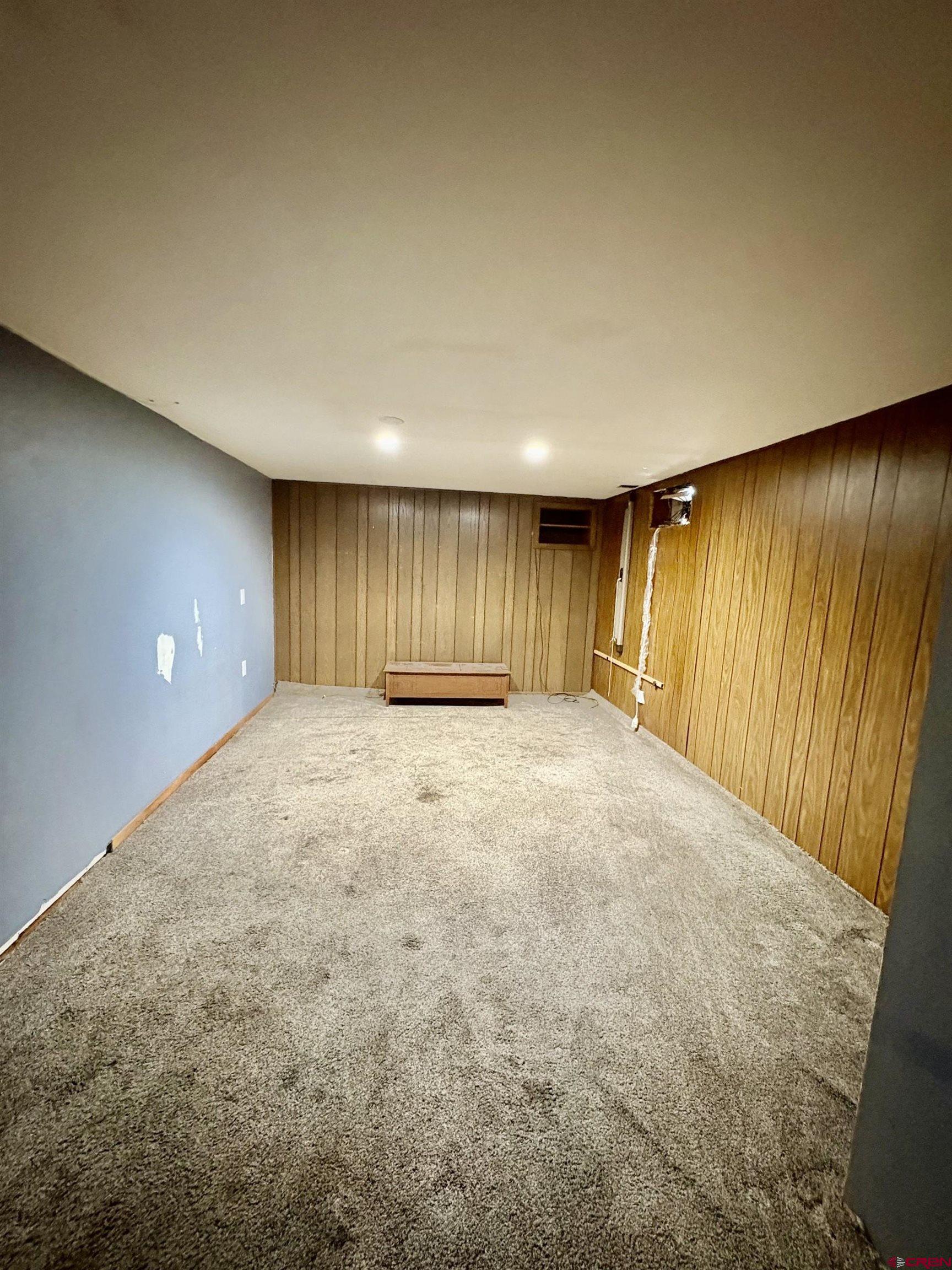 1738 East 7th Street Delta, CO 81416 - Photo 30 of 38 a view of an empty room with a window