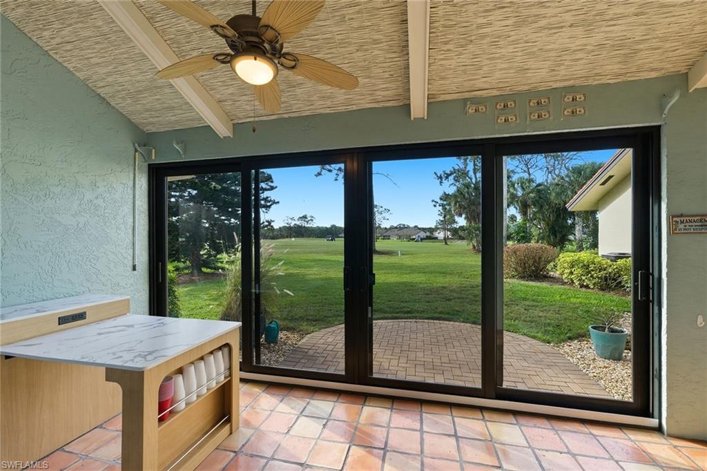 646 Augusta Boulevard Naples, FL 34113 - Photo 36 of 43 a kitchen view of a garden