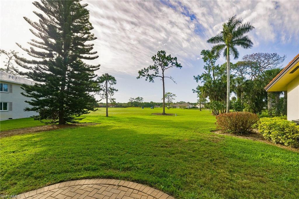 646 Augusta Boulevard Naples, FL 34113 - Photo 37 of 43 a view of a park with a tree