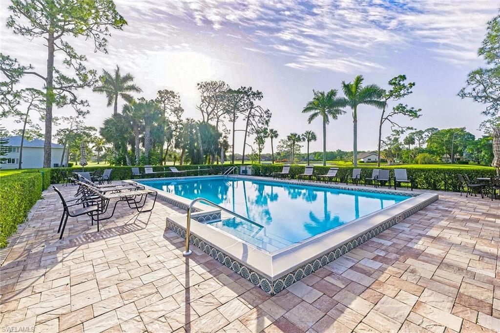 646 Augusta Boulevard Naples, FL 34113 - Photo 43 of 43 swimming pool view with a garden space