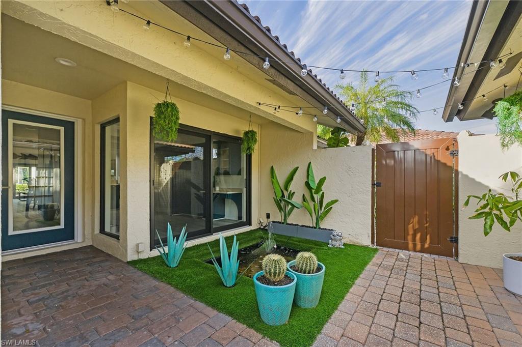 646 Augusta Boulevard Naples, FL 34113 - Photo 6 of 43 a view of a entryway door of the house