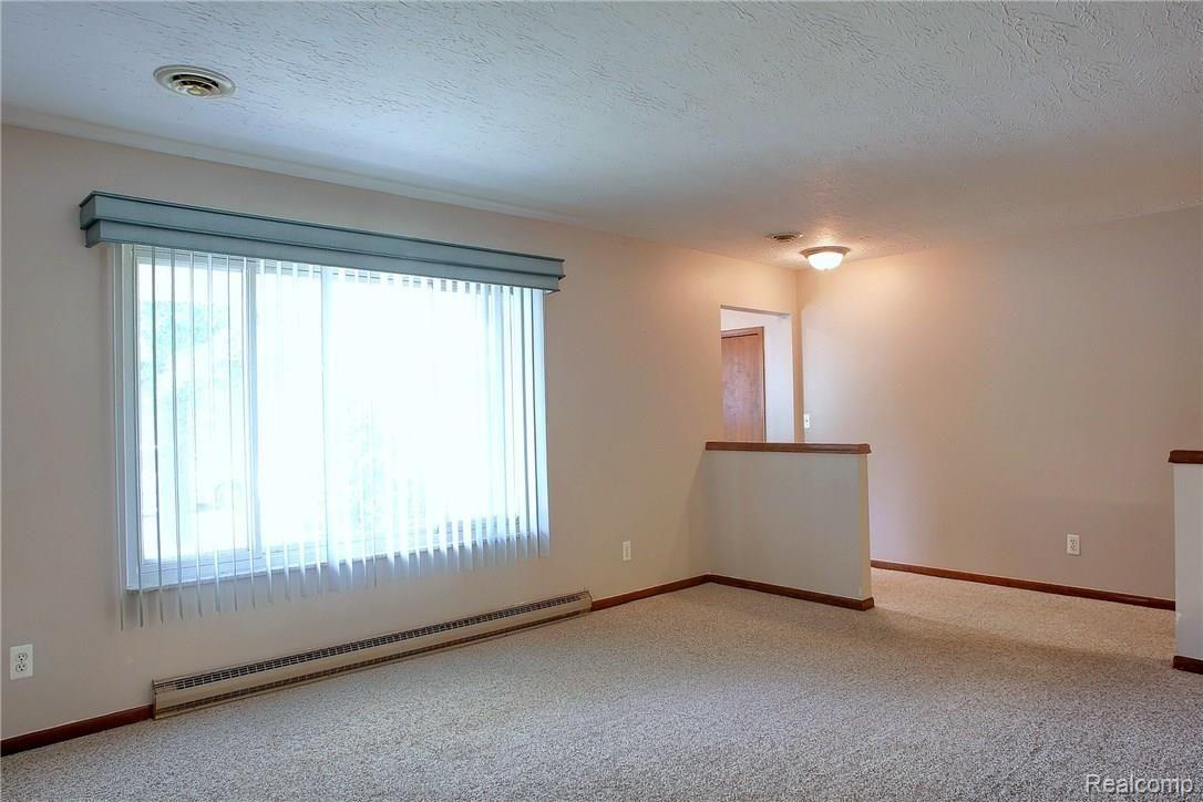 52126 Romeo Plank Road Macomb, MI 48042 - Photo 14 of 30 LIVING ROOM - VIEW 1