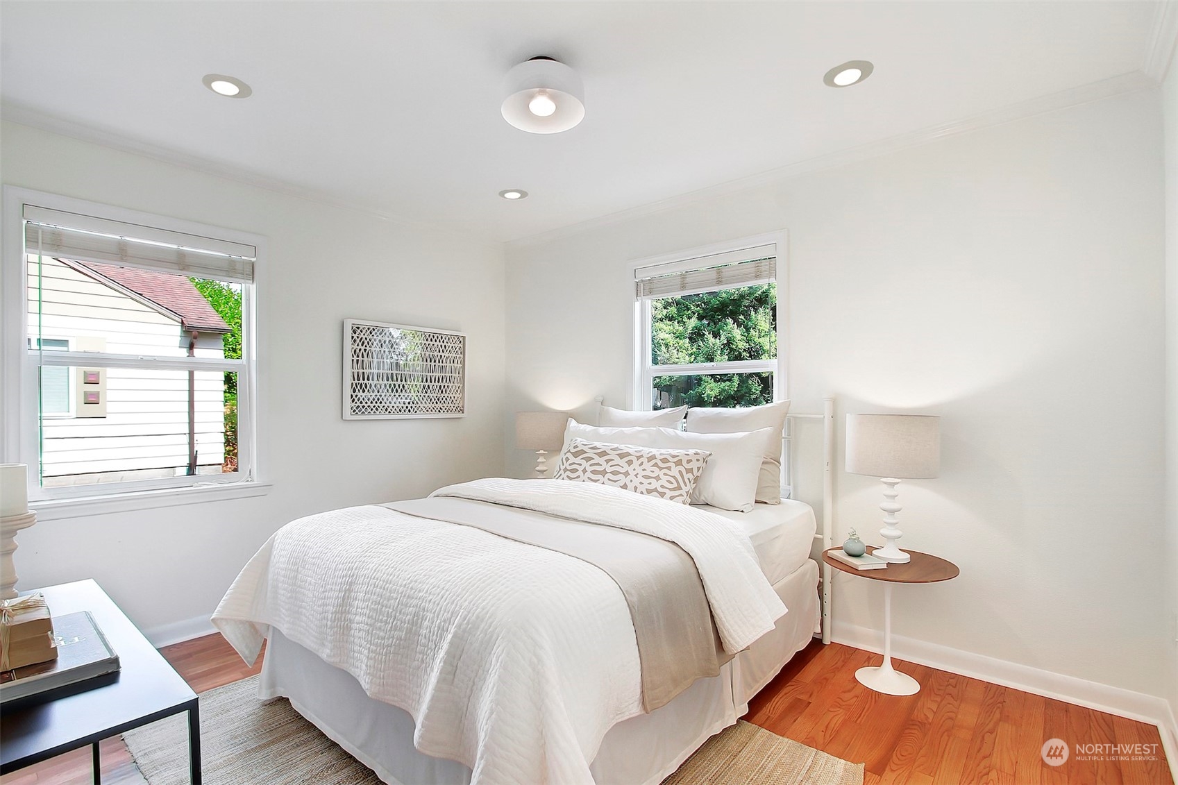 9913 32nd Avenue Southwest Seattle, WA 98126 - Photo 16 of 29 a bedroom with a bed and window