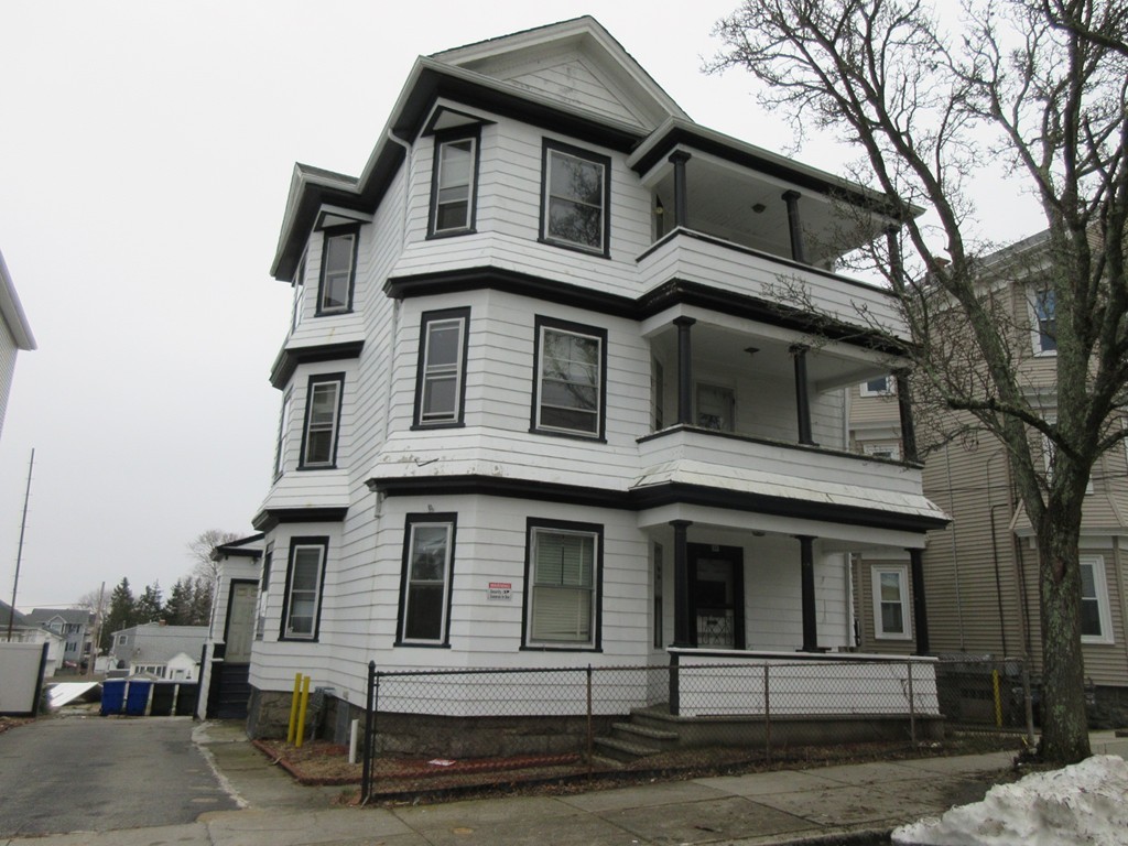 52 Huard Street Fall River, MA 02721 - Photo 1 of 17 a front view of a house with yard