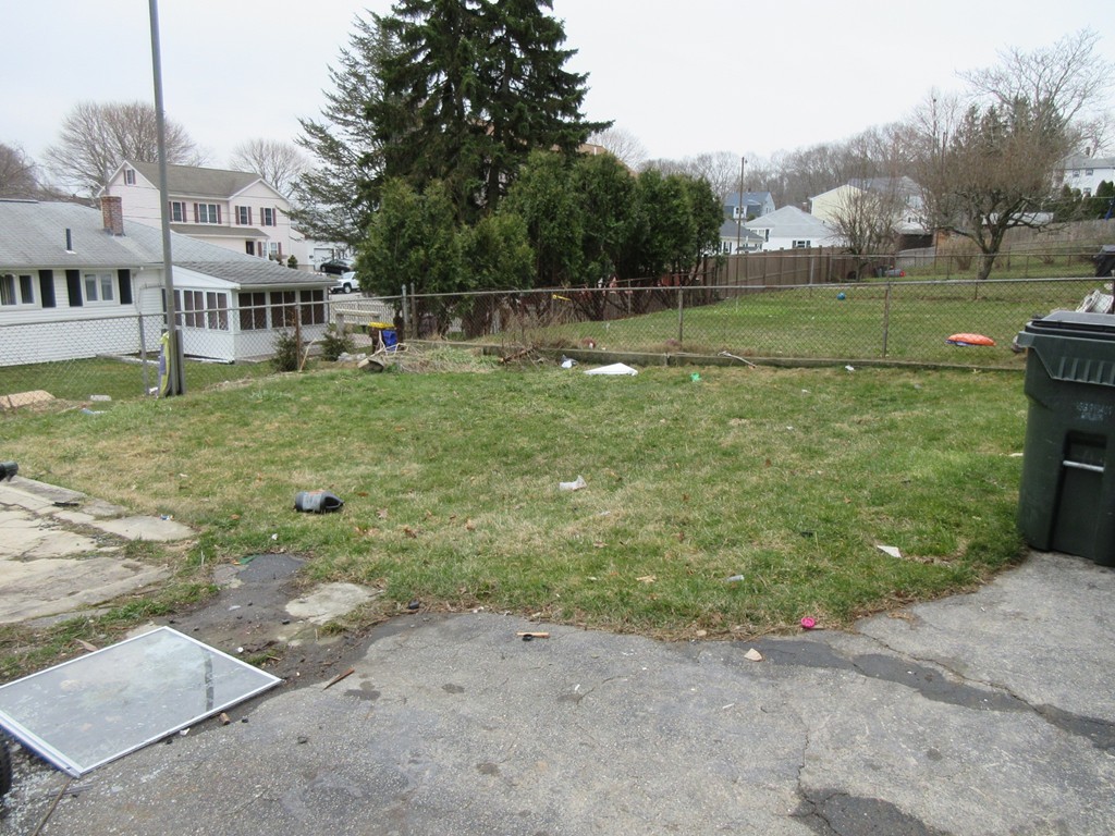 52 Huard Street Fall River, MA 02721 - Photo 16 of 17 a view of a garden with a house