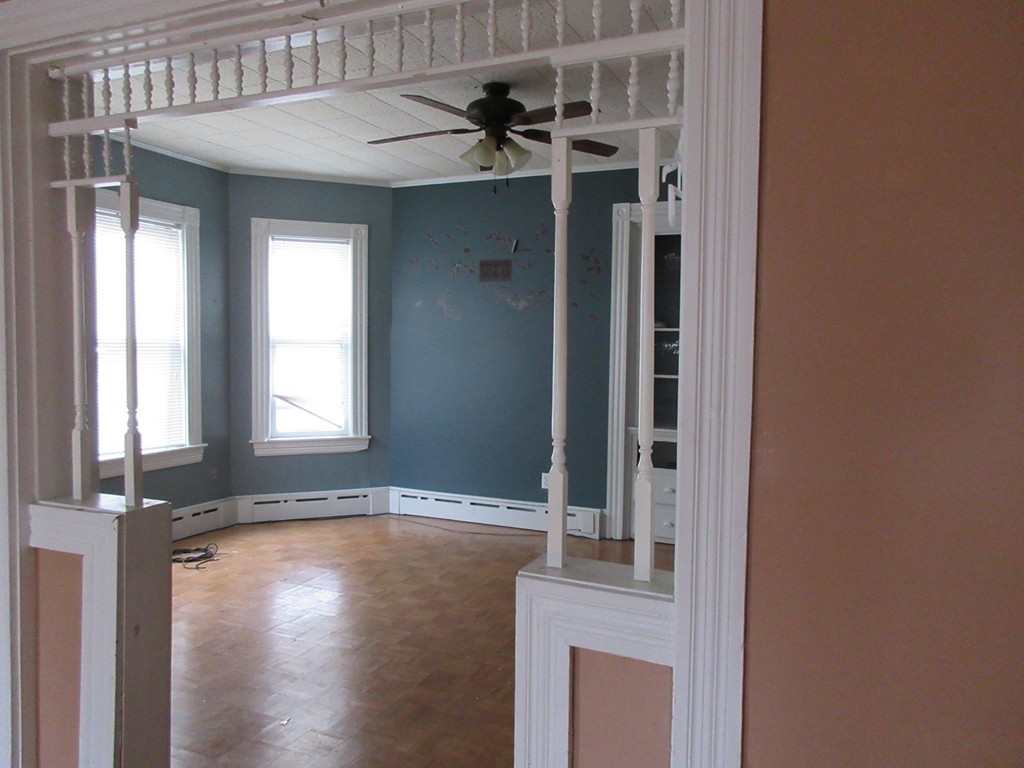 52 Huard Street Fall River, MA 02721 - Photo 7 of 17 a view of a front door and bedroom